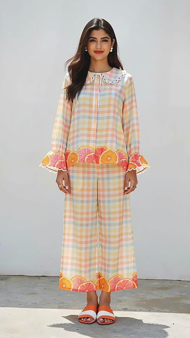 CUTE PRINTED PANTS - CHECK PRINT WITH CITRUS PRINT BORDER, FRONT VIEW  POSE. RELAXED FIT PANTS.