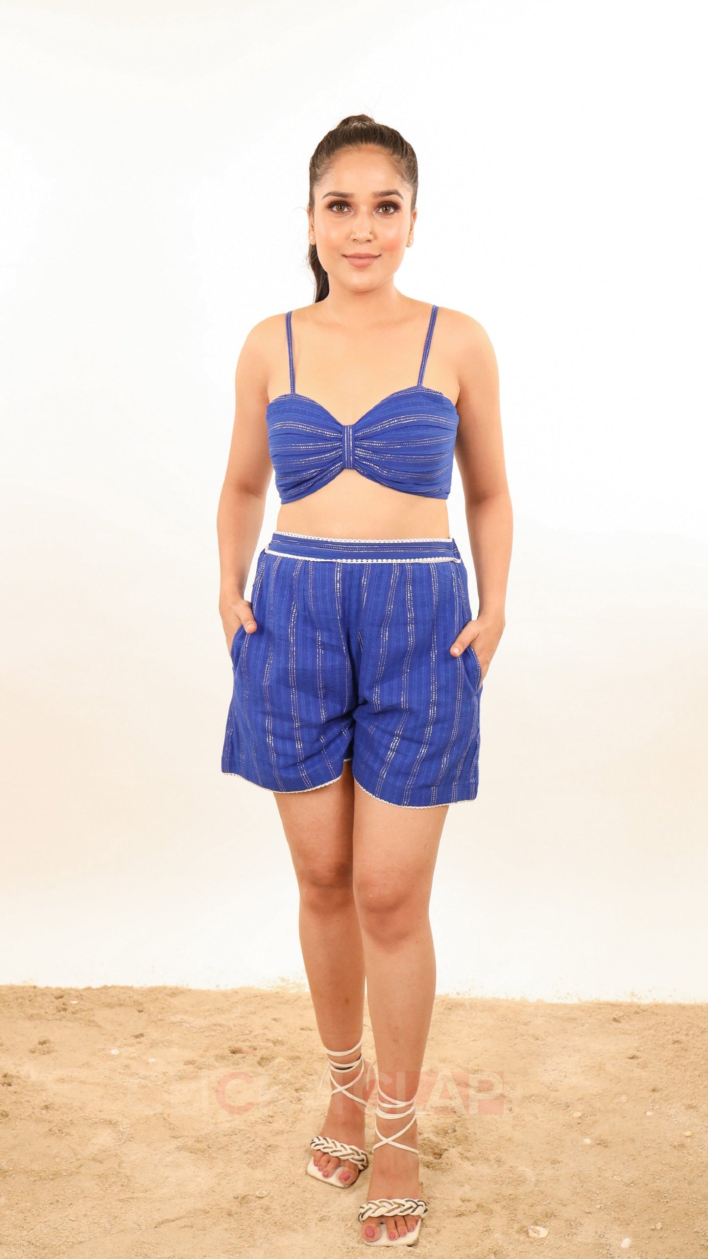 Nova set, showcasing shorts & crop top in lurex cotton fabric in royal blue color. perfect for resort wear or each wear.