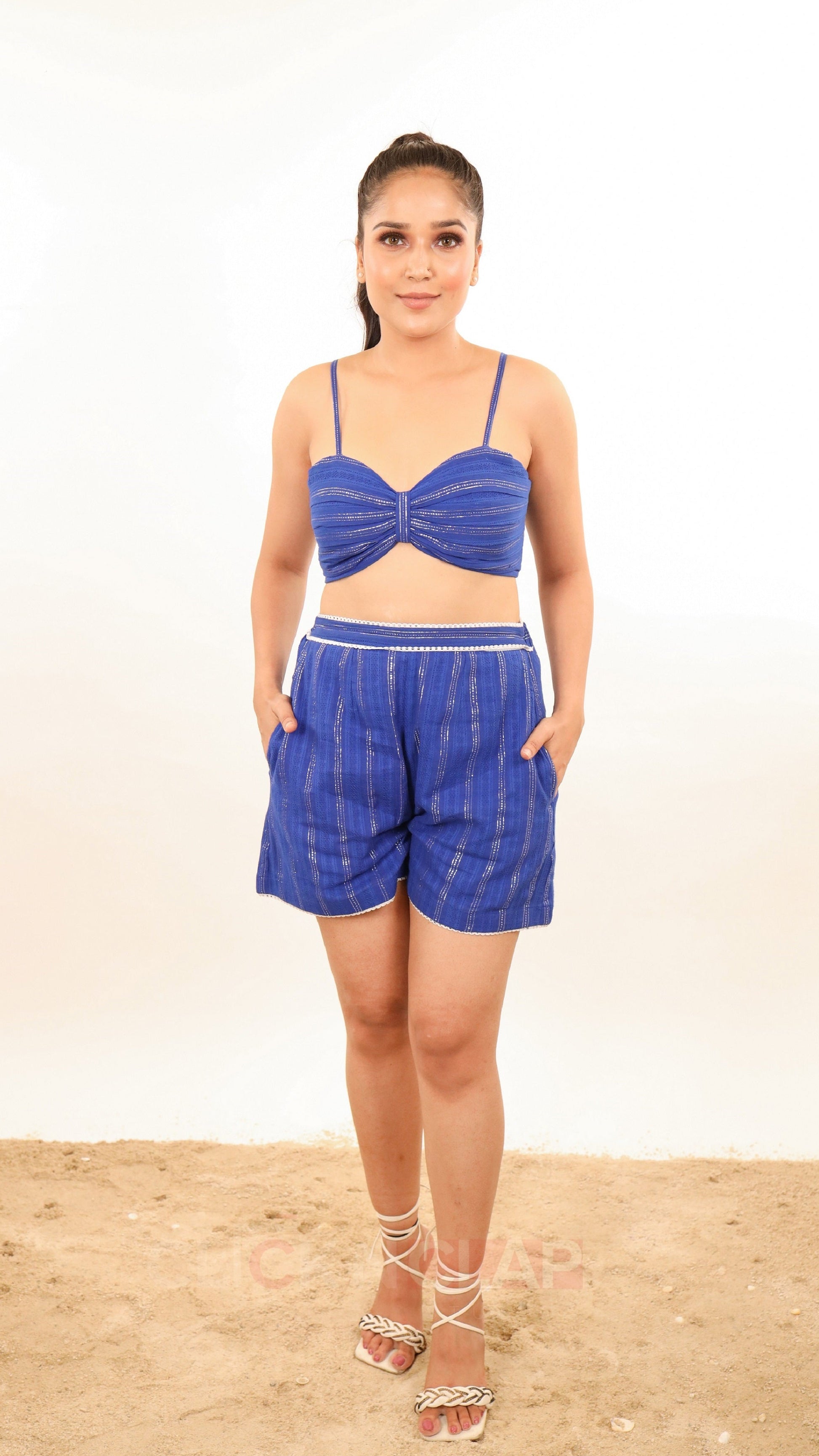 Nova set, showcasing shorts & crop top in lurex cotton fabric in royal blue color. perfect for resort wear or each wear.