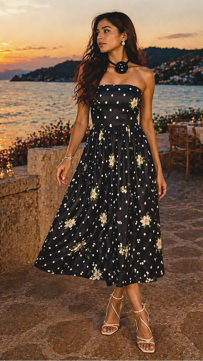 Vacation-ready polka floral midi dress styled for summer evening, chic outfit for brunch or date night.